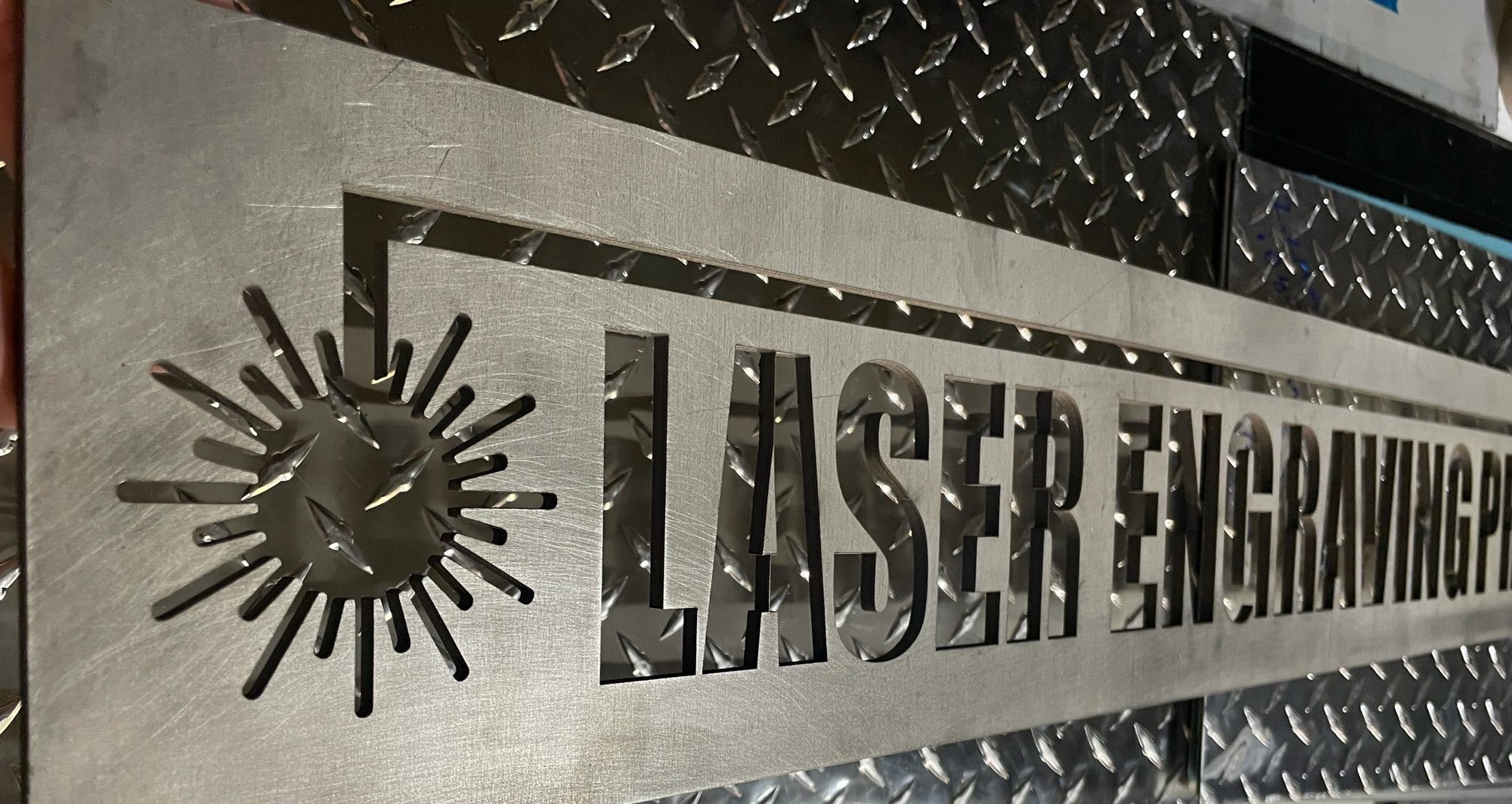 Precision laser-cut metal sign with intricate design details and premium finish